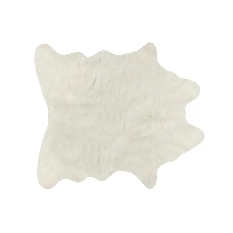 Solid Color Shela Tufted Faux Sheepskin Area Rug in Off White | Wayfair North America