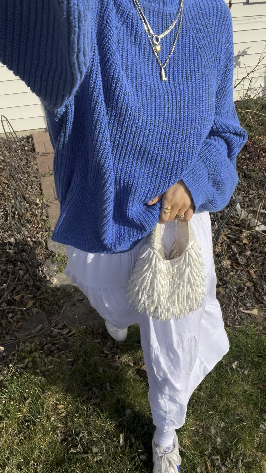skirt + oversized sweater + cute purse = best spring combo 🦋

#LTKstyletip #LTKsalealert #LTKVideo