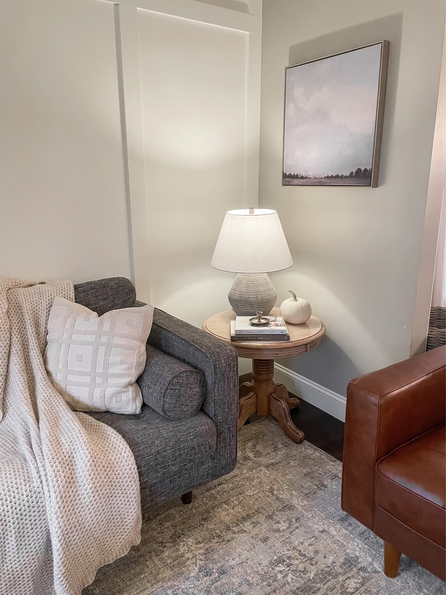 I found this canvas on clearance at Target for $16!  

Living room neutral decor.  Living room table lamp.  Wooden side table.  Gray sofa.  Target Studio McGee wall art.  Canvas art.  Leather mid century armchair.  Neutral pillow.  Chunky knit throw.  Loloi Rosemarie area rug.  

#LTKsalealert #LTKunder50 #LTKhome