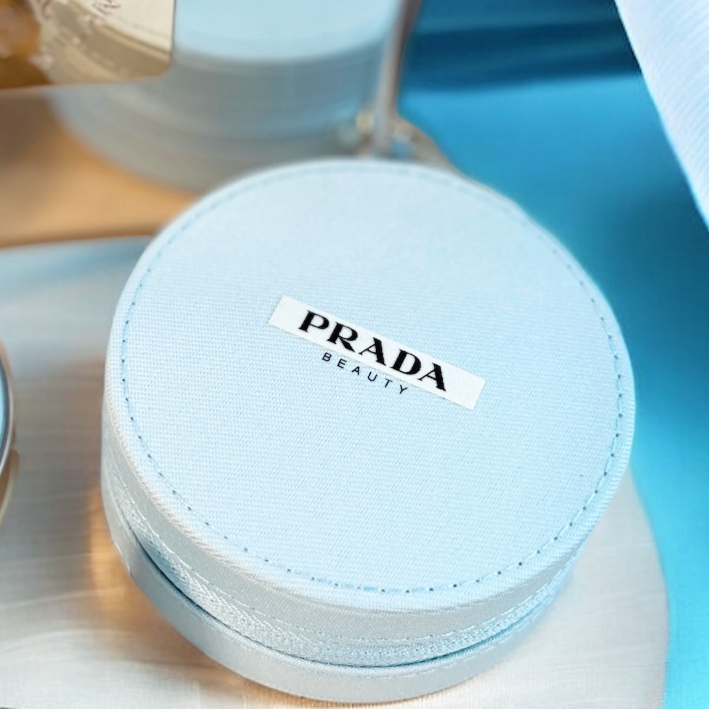 Prada Reveal Mesh Cushion in Collector Blue 🩵

This shade alone stopped me in my tracks.

Only available in select Asian markets, this collector edition had me waiting not so patiently. The iconic Reveal Mesh Cushion, paired with the blue Prada pouch, is equal parts fashion object and beauty essential.

Soft-focus skin. Weightless wear. A shade that already feels iconic.

Proof that having the blues can actually be a very good thing 🩵

Are you as obsessed as me? 
#pradabeauty #limitededition #foundationmakeup #newbeauty blueaesthetic 
@pradabeauty @prada