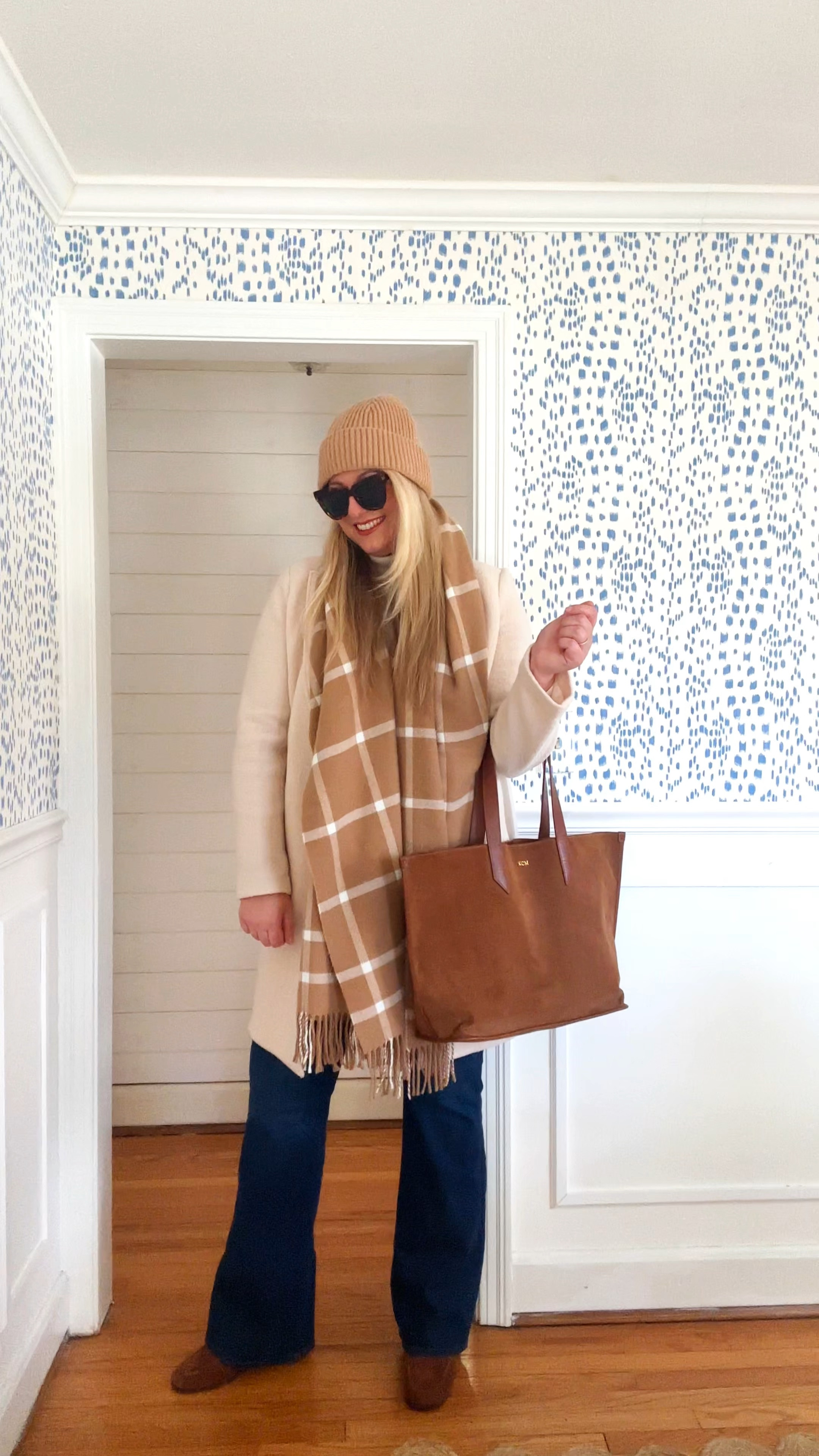 One of my favorite winter outfit formulas: Pair a cashmere turtleneck with a pair of high waisted boot cut jeans, add a block heel loafer, cute wool jacket, plaid wool scarf, great leather tote, ribbed beanie hat, and tortoise shades. 

Note scarf, loafers, jeans, & turtleneck on sale now.

Linking these pieces or similar so you can recreate this look.

#LTKSaleAlert #LTKOver40 #LTKWatchNow