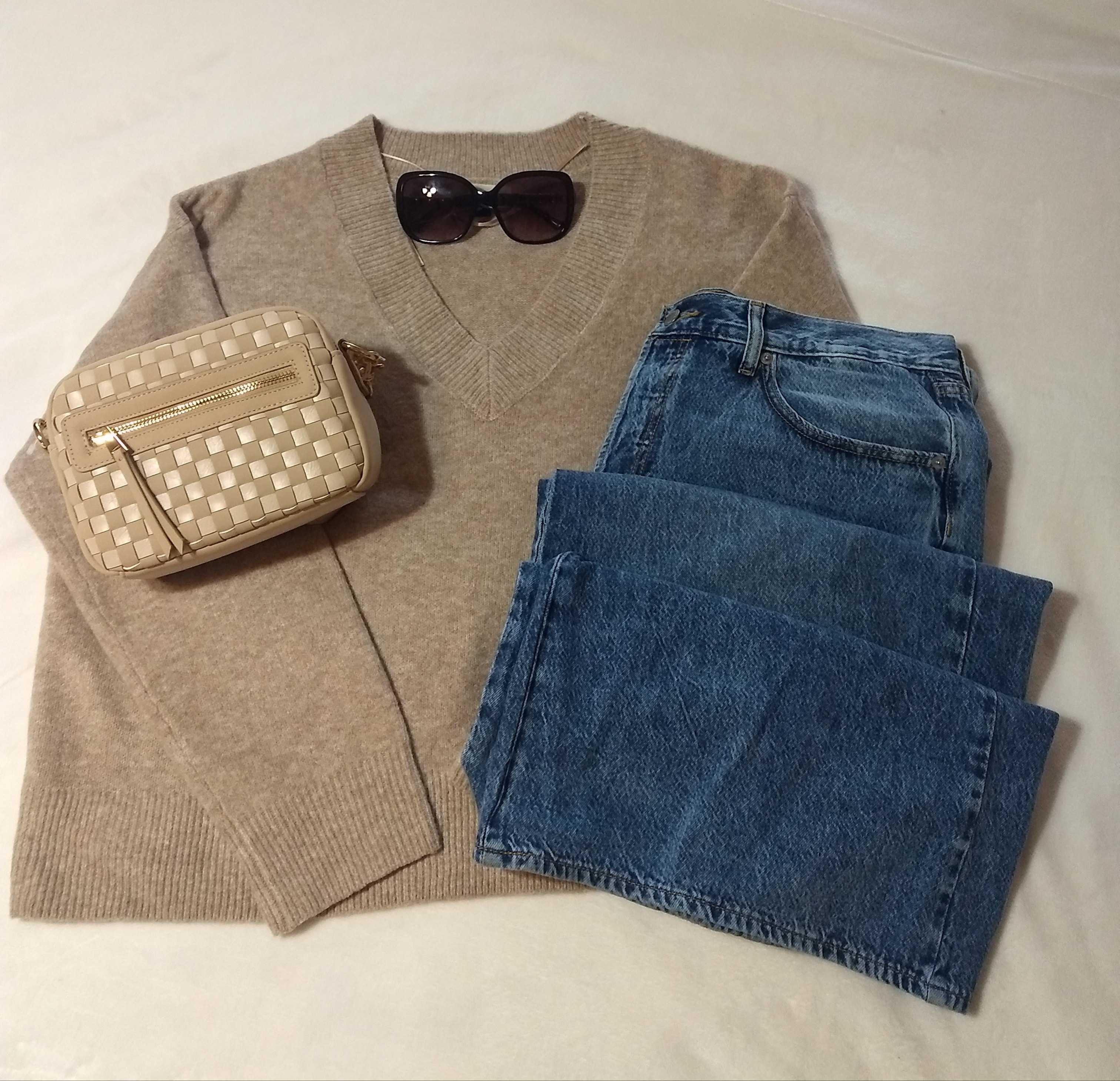 This beige v-neck is soft and comfy.  I sized up for an oversized fit.

#LTKOver40 #LTKSaleAlert #LTKFindsUnder50