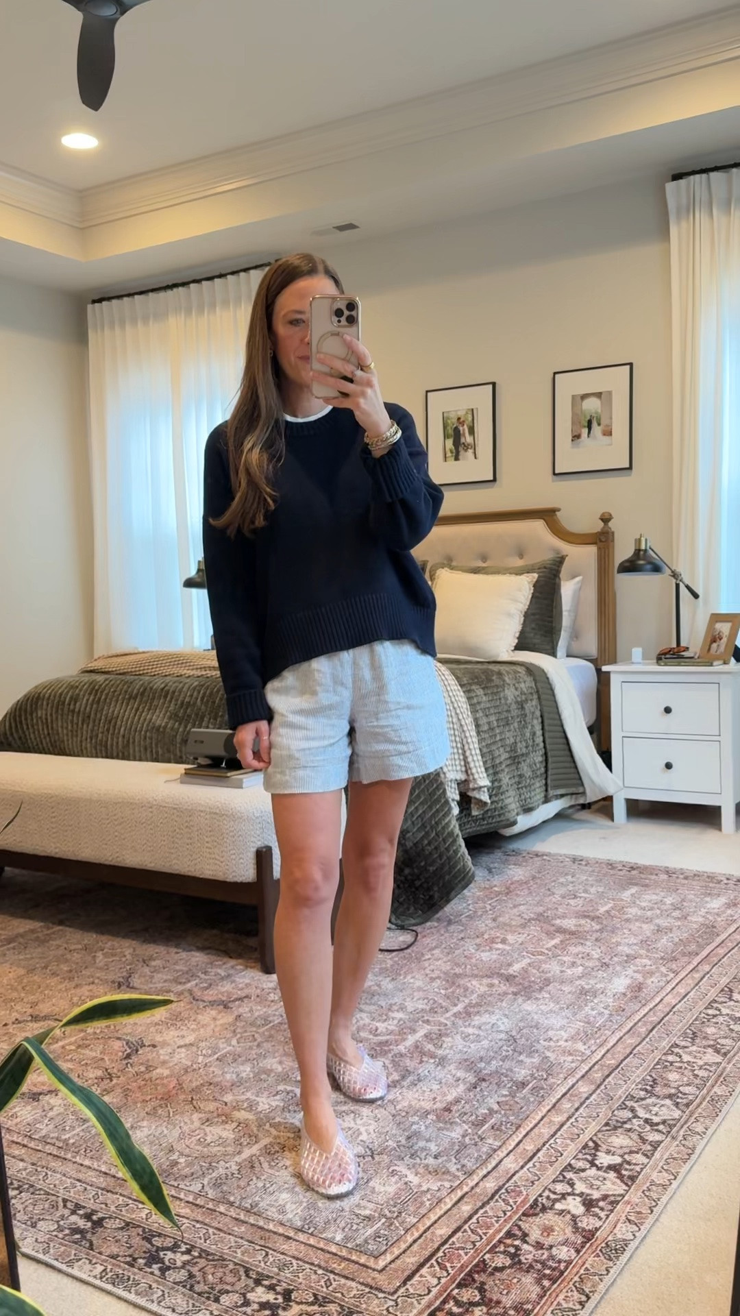 Rainy day summer outfit ☁️🌧️ Sometimes summer calls for shorts and a sweater. Styled these blue striped linen shorts with a cropped boyfriend sweater layered over a basic white tee and finished the look with clear jelly flats.

It feels coastal, classic, and practical for chilly restaurants, rainy afternoons, and over-air-conditioned spaces.

Use my code INFG-26LINENANDLIGHTCO10 for 10% off your first Quince order 🤍

#LTKootd #LTKmomlife #LTKSeasonal