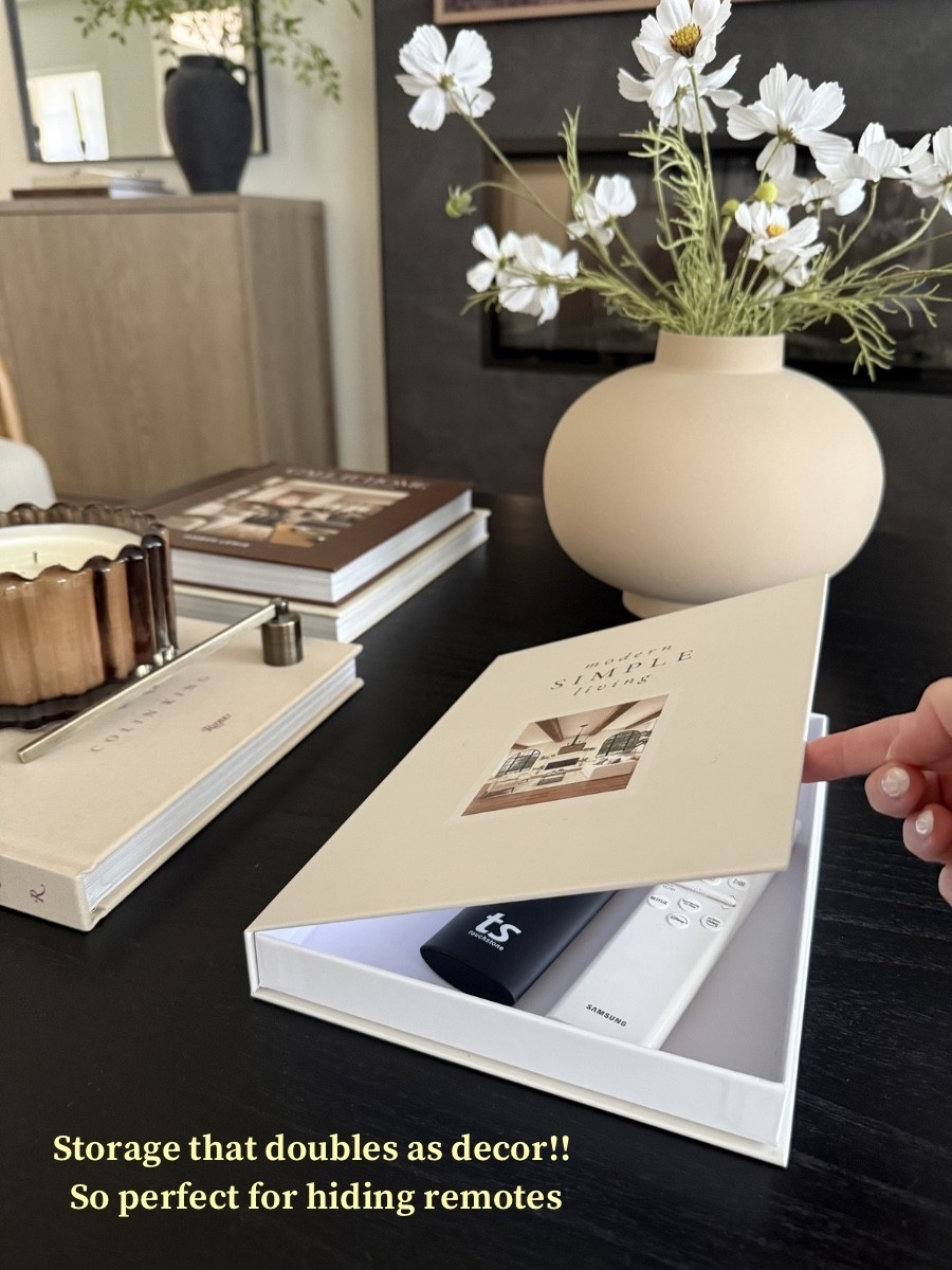 Storage that doubles as decor! 🙌🏻 
I love these hidden storage coffee table books to hide remotes while keeping them easily accessible. 
•
•
Coffee table decor, coffee table books, storage books, faux books, faux storage books, coffee table styling

#LTKHome #LTKSaleAlert