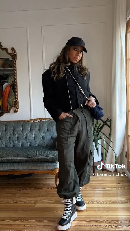 One way to style cargo pants and style ankle boors 

#LTKstyletip #LTKSeasonal #LTKitbag