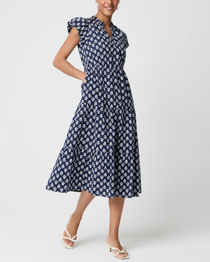 Navy and white patterned ruffle sleeve midi dress

#LTKSeasonal #LTKSaleAlert