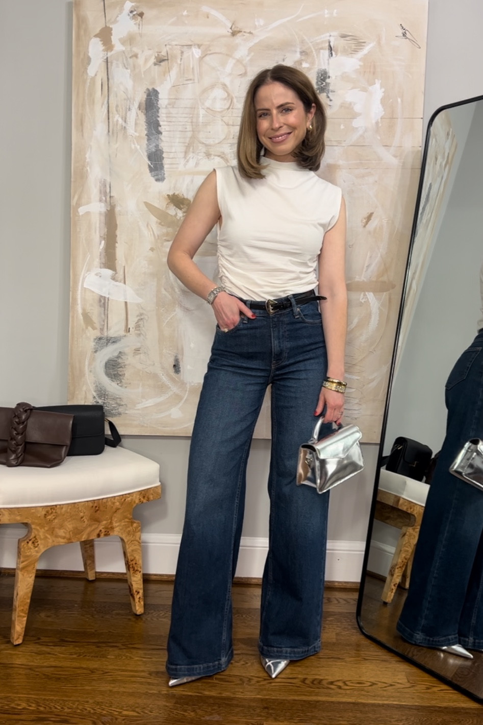 Gap wide leg dark wash jeans, run big!
White mock neck top Anthropologie
Jcrew silver metallic mini bag
Silver metallic slingback heels 

#LTKstyletip #LTKshoecrush #LTKitbag