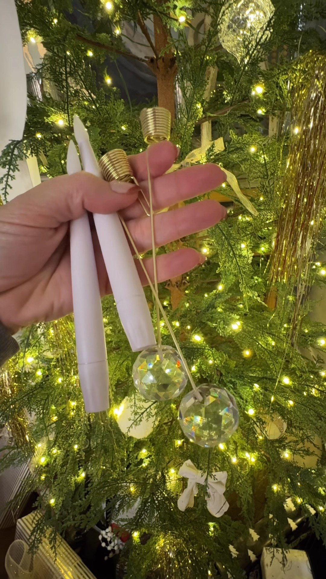 Flicker taper candle and crystal ball candle holder for your tree. Require AAA batteries and have a remote 

#LTKSeasonal #LTKHoliday #LTKHome