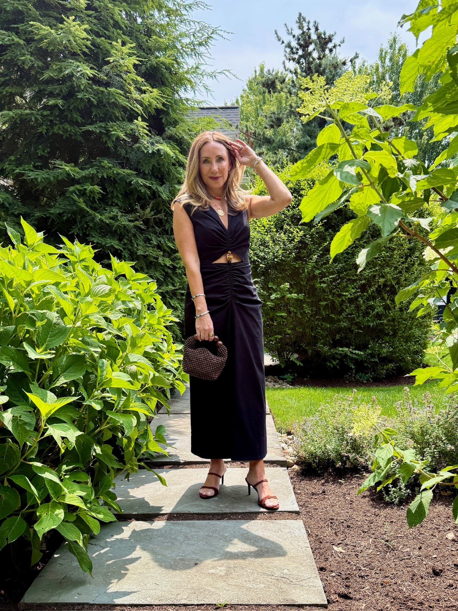I'm not usually a cutout person. But this dress? It strategically placed these cutouts, that become totally tasteful. I'm here for it! A flattering surprise!

Styled with a "sandwich" of brown accessories! Same shade for the bag and shoe to pull it all together. 🤎

#LTKBeauty #LTKgrwm #LTKootd