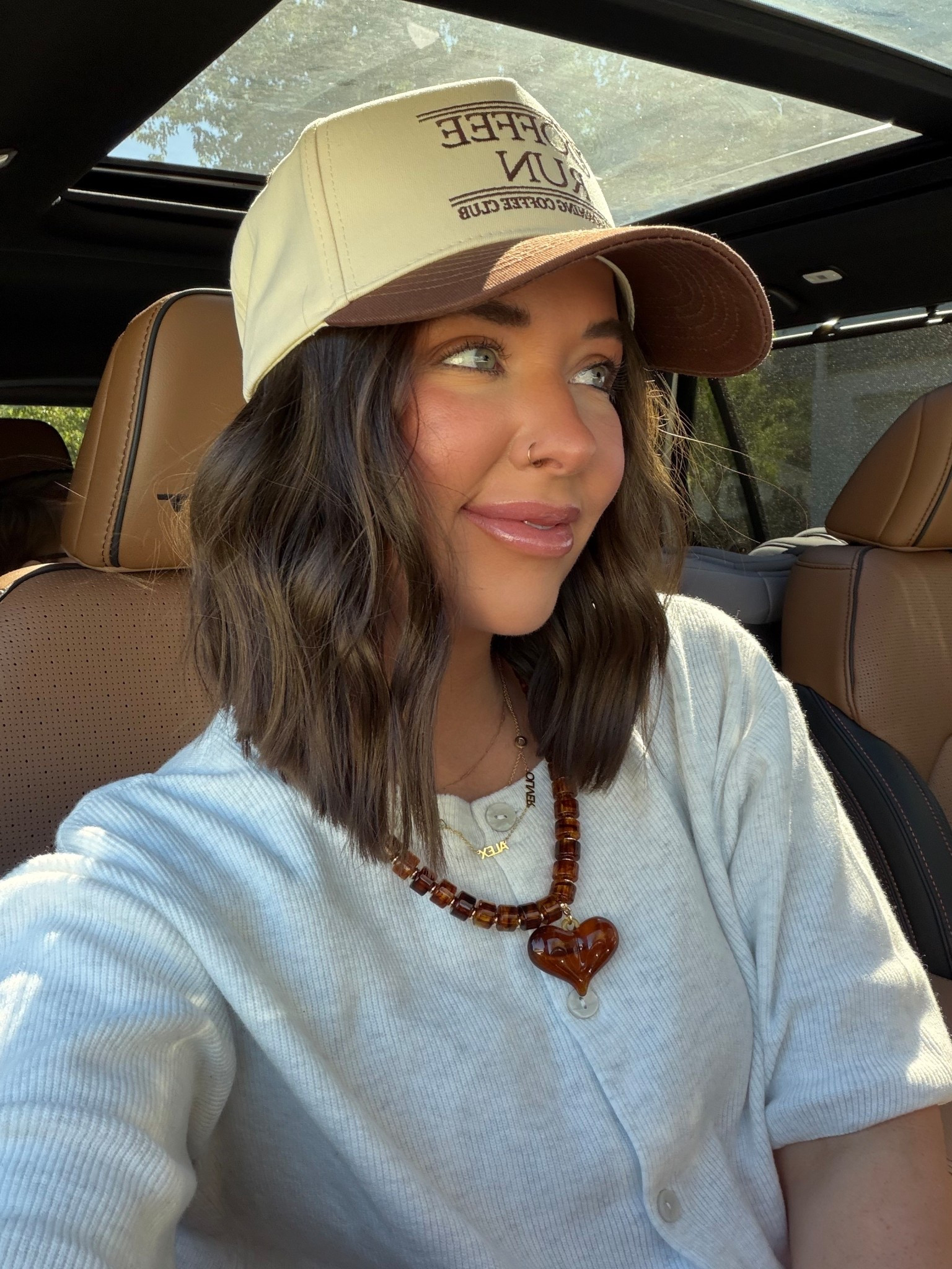 Loving this dark color for fall 🤎🤎 linking my cardigan today and my trucker hat!

And of course all my jewels I wear everyday 🍂🥰

Target short sleeve cardigan, coffee run trucker hat, the sis kiss necklaces, gold jewelry 

#LTKSeasonal #LTKFindsUnder50 #LTKBeauty