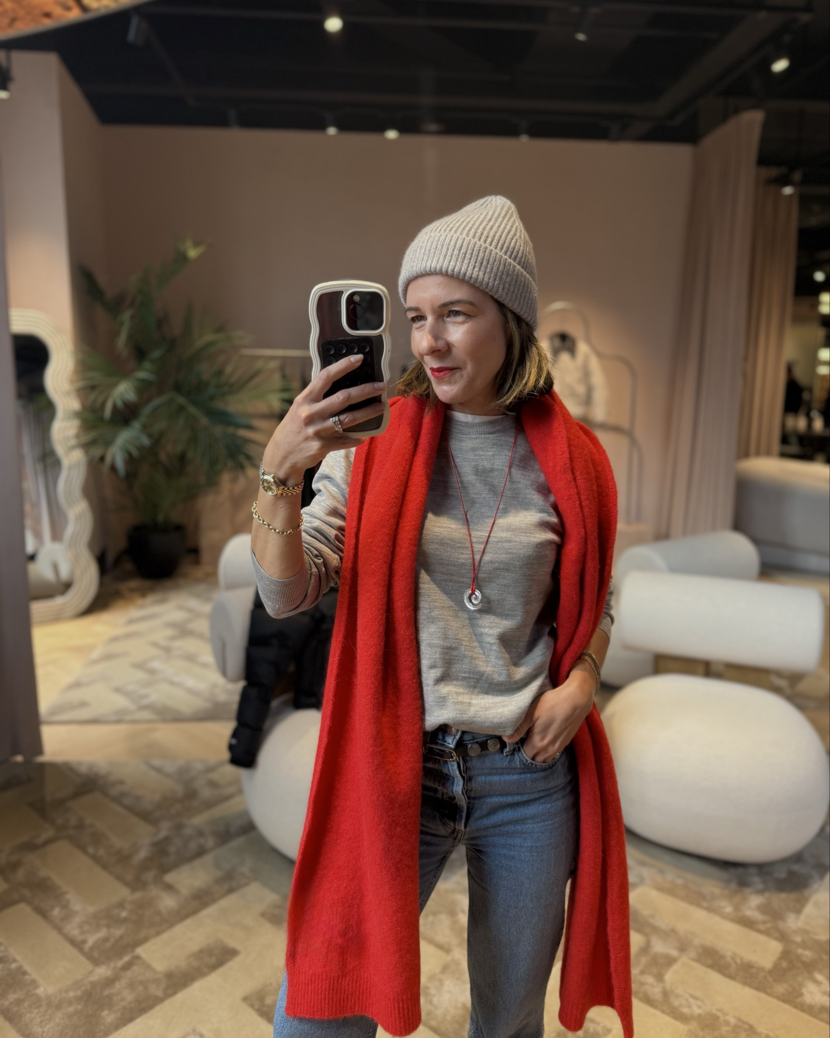 I don’t do colour. Except apparently in 2025. 👀 🍅 
Puffer, grey knit, jeans and boots — all very me… then this red scarf walked in and stole the show ❤️‍🔥 

#LTKuk #LTKstyletip #LTKwinter