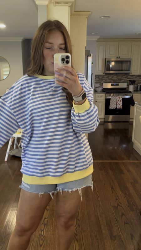 Wearing size XL. Runs more tts than oversized. Size up 1 if you want a more oversized fit. Comes in a bunch of colors. Very similar to a more expensive sweatshirt. 

Sweatshirt / spring outfit / summer outfit / stripes / striped sweater / coastal grandma / midsize 

#LTKmidsize #LTKtravel #LTKfindsunder50