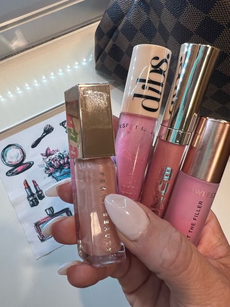 These are the pink lip glosses I love and have been wearing lately. Holy grail lipgloss. Makeup, makeup routine, makeup bag, Fenty Beauty, Dibs Beauty, Buxom, Lawless, #LaidbackLuxeLife

Shades:

Fenty Beauty ‘$weetmouth’
Dibs Beauty ‘Italian Soda’
Buxom ‘White Russian Sparkle’
Lawless ‘Daisy Pink

Follow me for more fashion finds, beauty faves, lifestyle, home decor, sales and more! So glad you’re here!! XO, Karma

#LTKFindsUnder50 #LTKBeauty