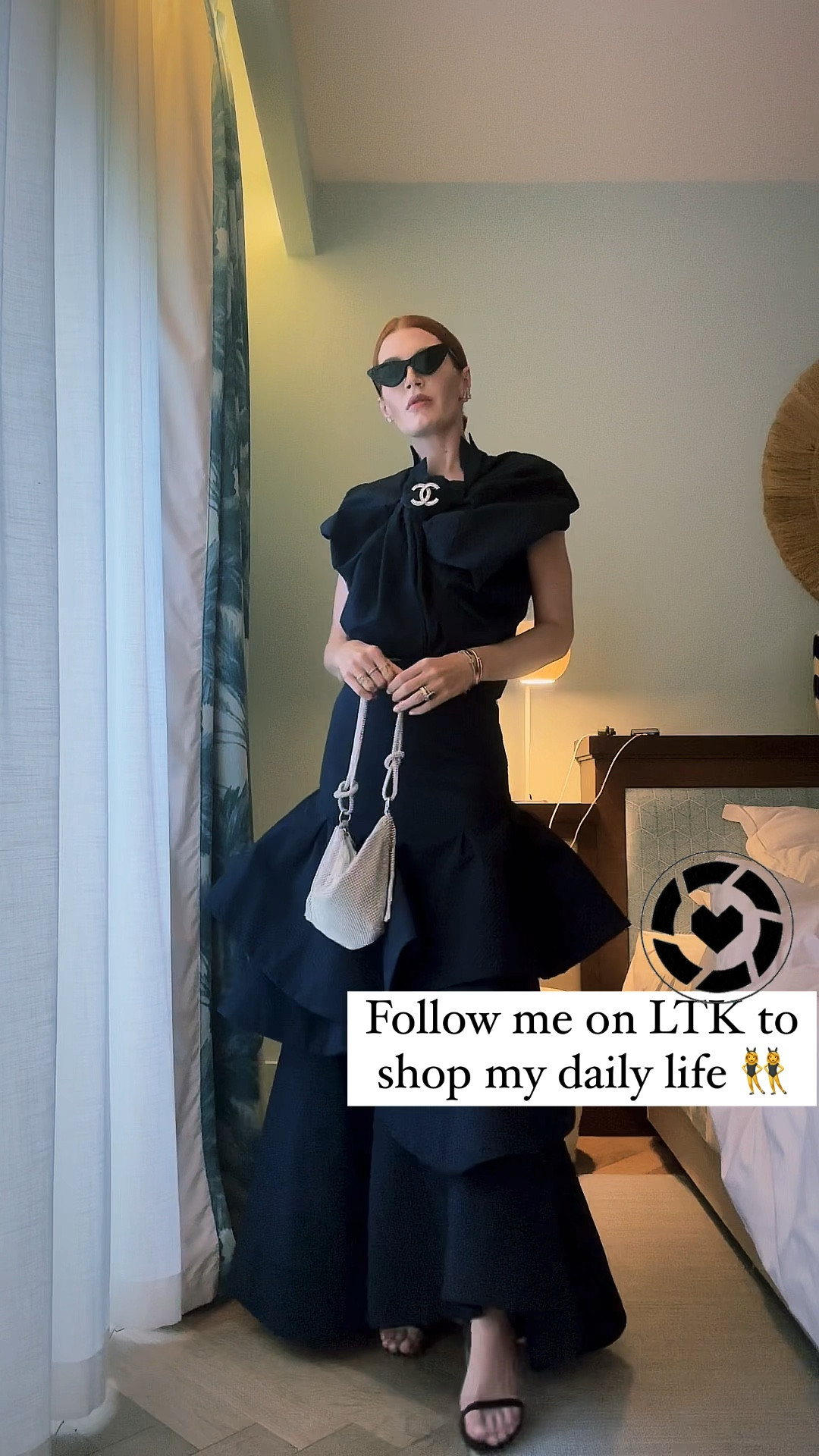 I wore a last season Rosie Assoulin skirt and top to a black tie wedding. 
My bag comes in the designer and the inspired version and I pulled out a Chanel brooch to make it sparkle. 
I love Rosie clothing and tagged a new season version. 

#LTKtravel #LTKFind #LTKwedding