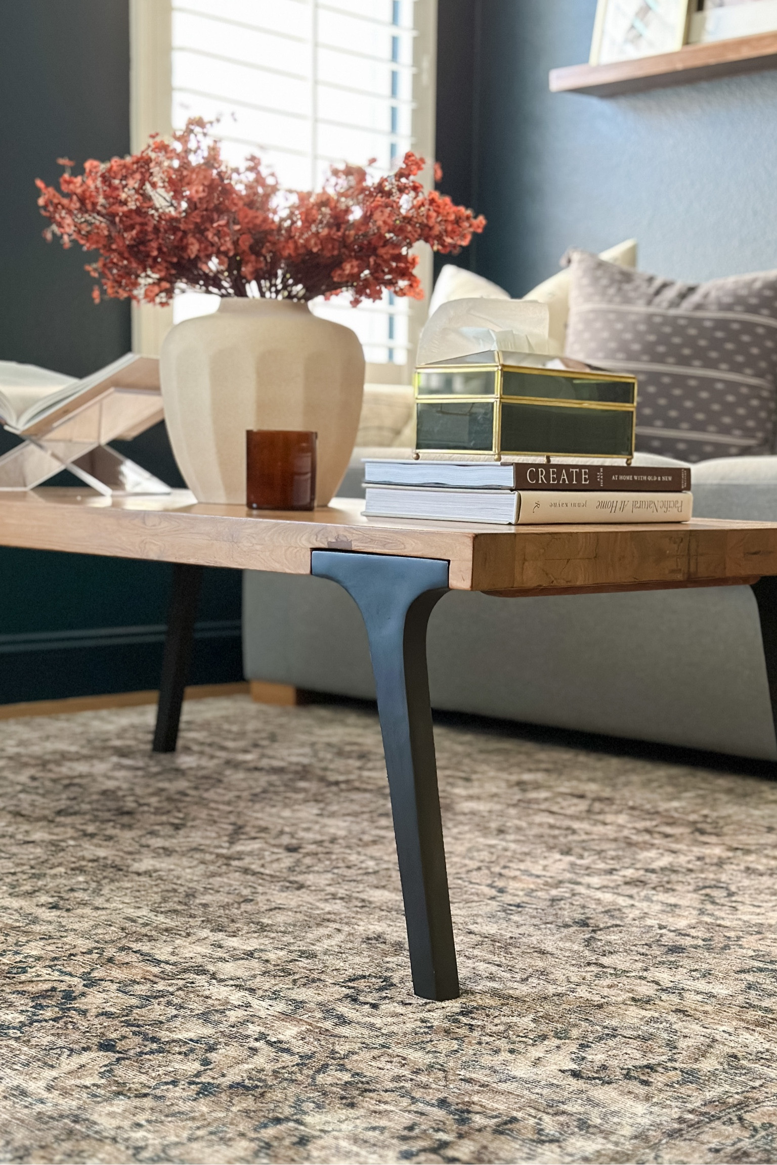 Fall coffee table decor, neutral vase, faux fall florals, fall stems, decorative tissue box cover, acrylic book stand, coffee table books.

#LTKSeasonal #LTKhome