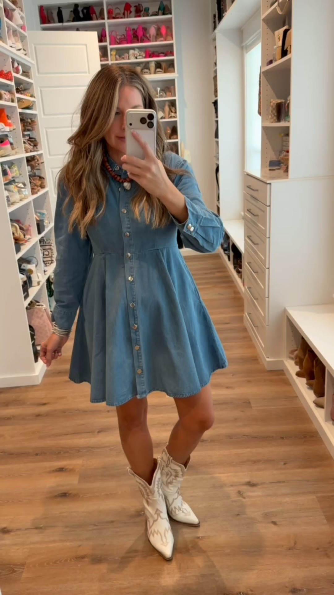 In a small denim button down long sleeve ruffle bottom dress, necklace, boots and accessories- fits tts.

#LTKFindsUnder50 #LTKStyleTip #LTKSeasonal