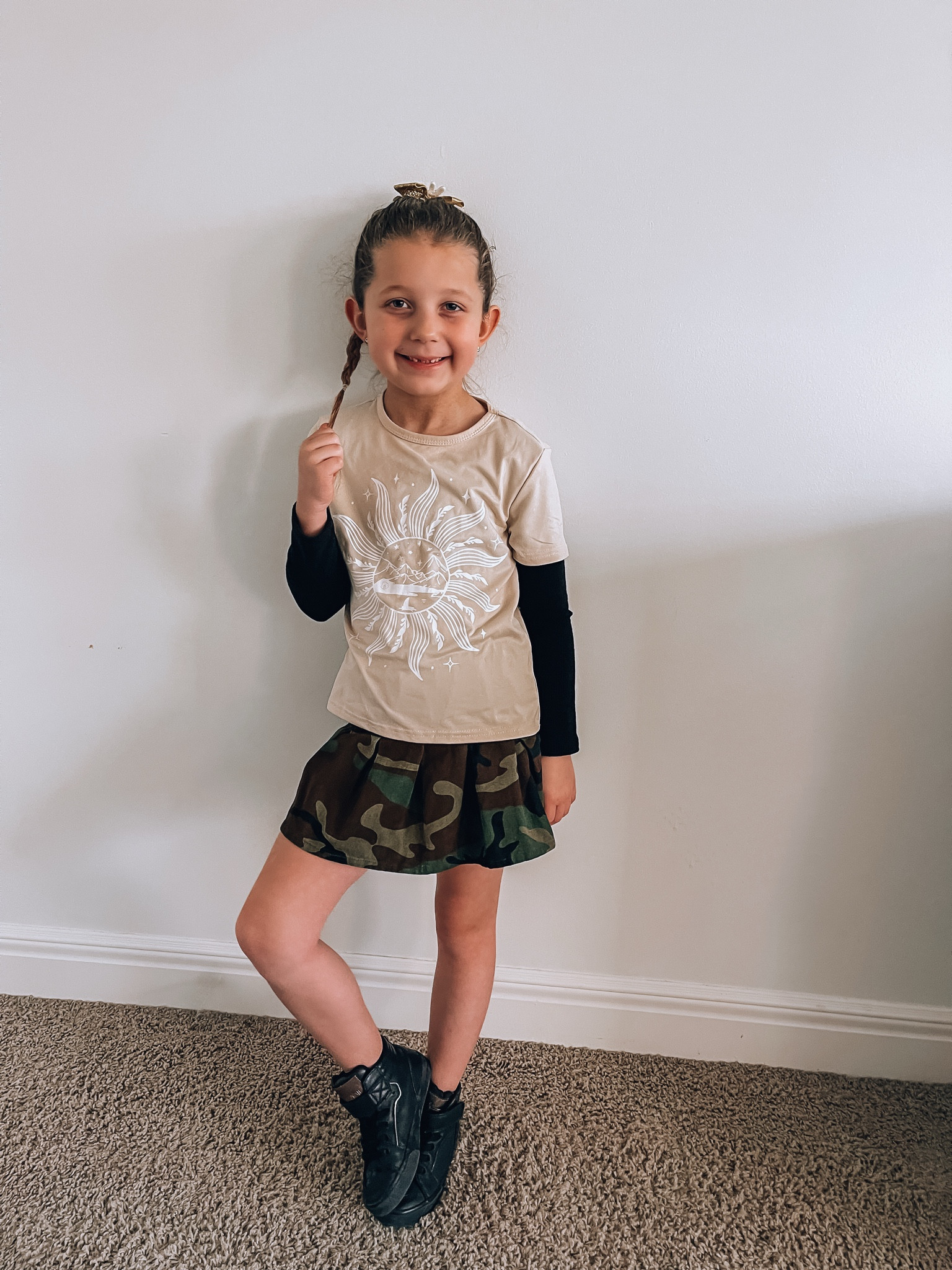 Girls camo print skirt camo skirt girls pleated skirts army camouflage Black high top sneakers grunge 90s vibes cute girls outfits for school 

#LTKKids #LTKFamily #LTKWatchNow 

#LTKHoliday #LTKGiftGuide #LTKFindsUnder50