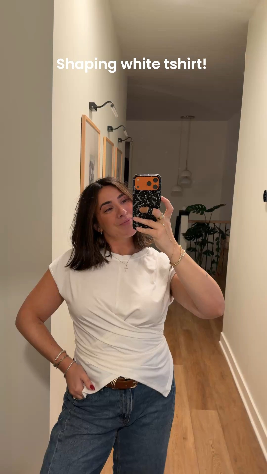 The most flattering white tshirt if you have a boxy body like me. Criss crosses and ties in the back to snatch you in. Size L