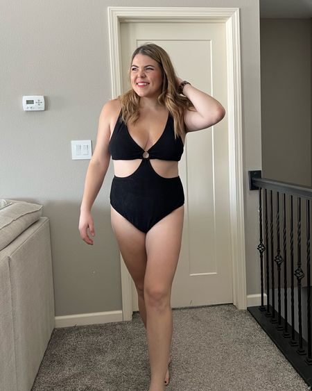 One piece swimsuit with cut outs from target size extra
Vacation - midsize 

#LTKFind #LTKcurves #LTKswim