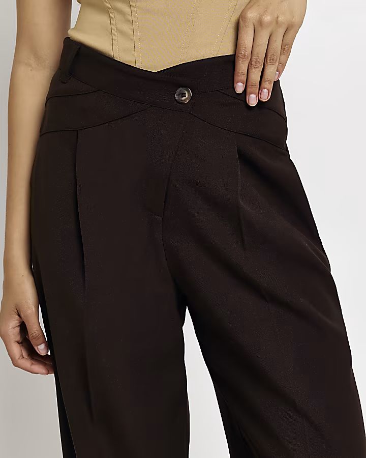 Brown crossed waistband straight trousers | River Island (US)
