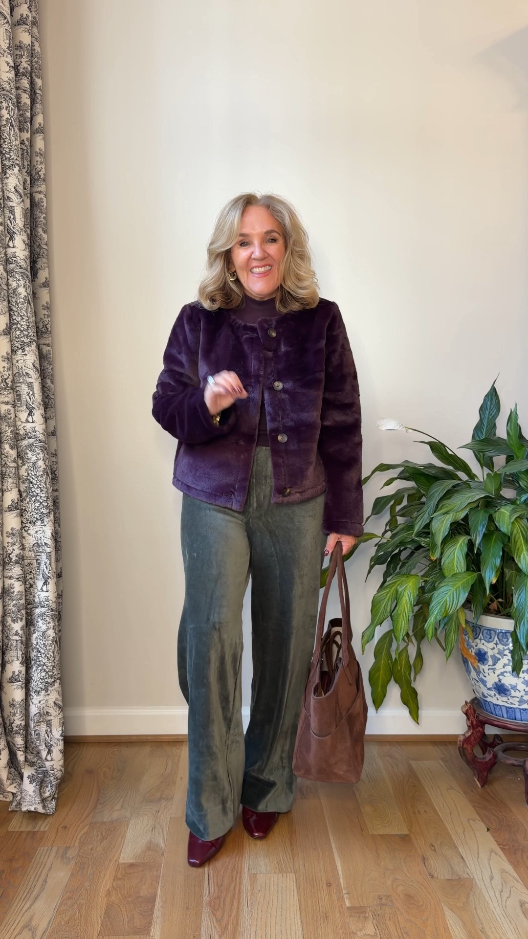 Faux fur in an eggplant purple it’s beautiful fun! Size medium.  pants are not corduroy. They are velour. Very soft very stretchy wearing a size 8.