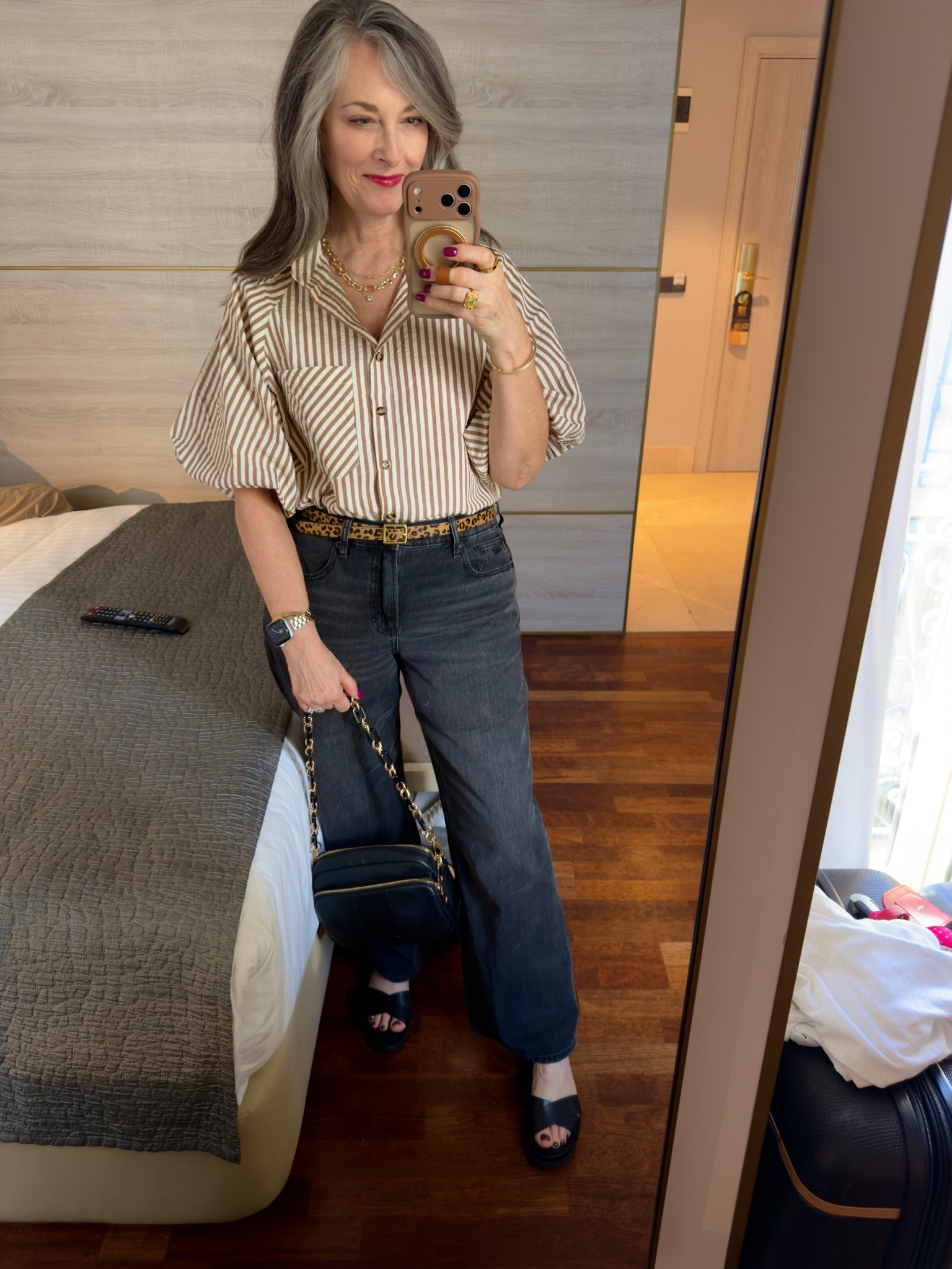 I wore this to dinner the first night we were in Madrid. We arrived in town around 4:30 and tired! This brown and cream stripe button down blouse was an easy choice. Size small in top and generous fit! My walking sandals are several years old, but I linked a similar pair in the same brand. 

Amazon Fashion | American Eagle | Cole Haan 

#LTKOver40 #LTKTravel #LTKStyleTip