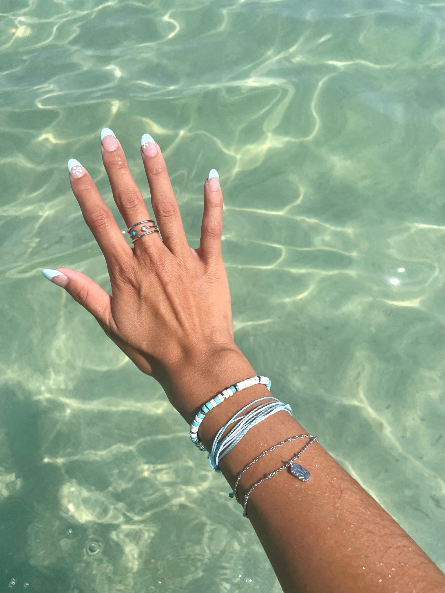 pura vida jewelry stack from their limited edition summer box. I tagged what I could because some styles are only available with the box 🩵 code: CAROLINEXO for $$ off!

#LTKtravel #LTKswim #LTKSeasonal