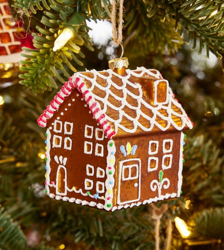 Gingerbread House Ornament

Make your holiday sweeter with this traditional motif. We trimmed our glass confection with “sugar icing” and gumdrops. Layer houses on the Christmas tree, pile them into a centerpiece, or tie them into gift wrap – then theme your decor with our other gingerbread ornaments, dishware, and table linens.

#LTKStyleTip #LTKHome #LTKSeasonal