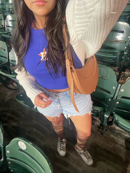 Astros baseball game outfit idea 
Blue Tank: small 
Abercrombie curve love Shorts: 28 
Bolero cardigan: small
Golden goose sneakers: 36
Polene bag 

#LTKFindsUnder100 #LTKSeasonal #LTKStyleTip
