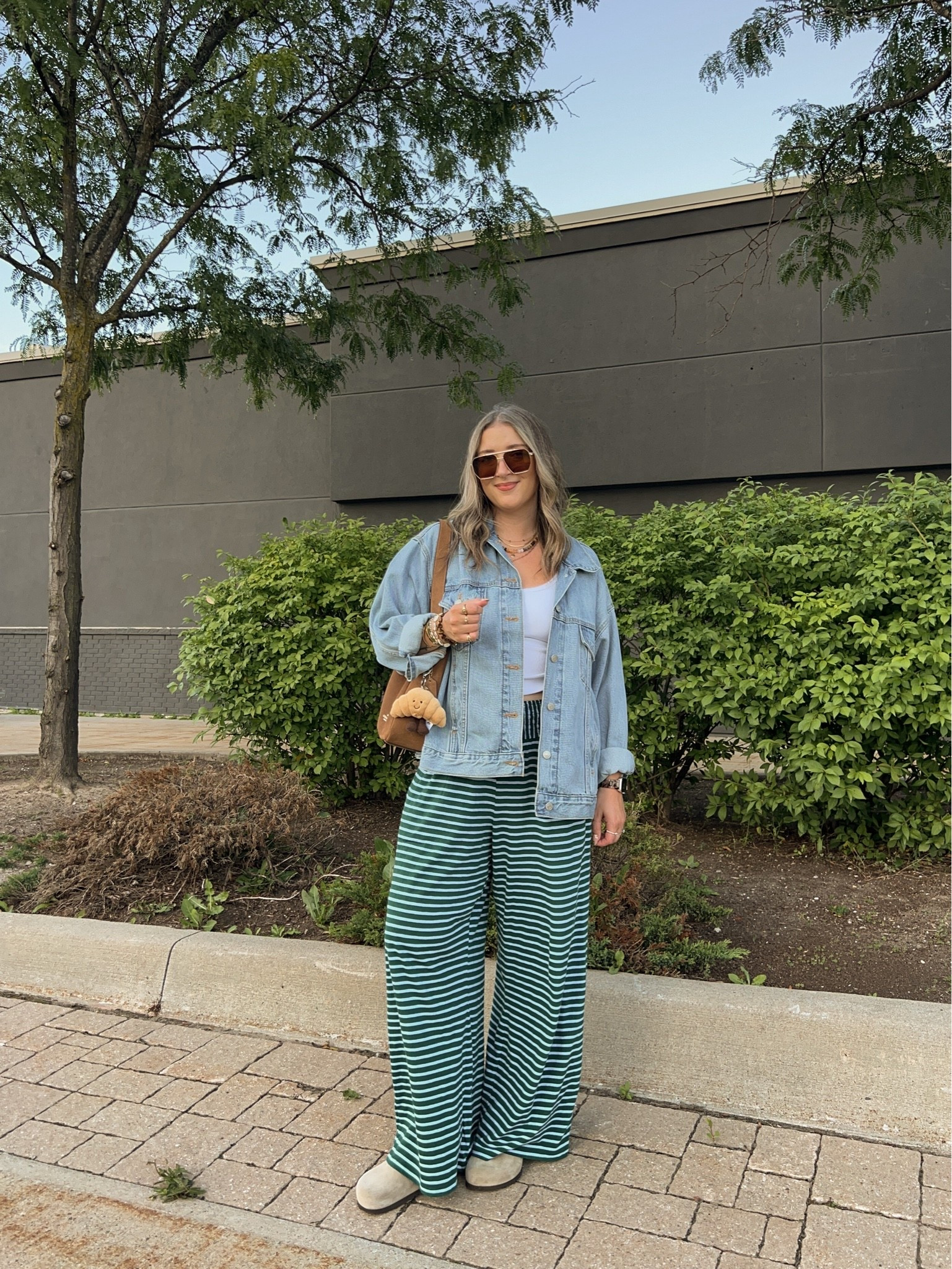 Comfy fall outfit! Wearing M in the bra free tank and L in the striped pants (currently 70% off!) Also linked similar sweater material pants for cooler weather! Sized up to XL in the denim jacket for an oversized fit. I’m a 9.5-10 shoe and wear a 40 in the Birkenstocks

#LTKfall #LTKsale #LTKstyletip