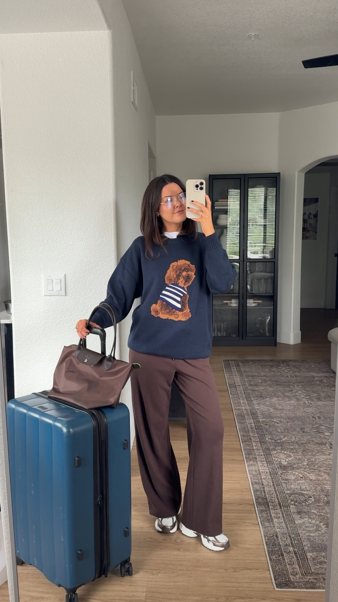 Fall travel outfit! I’m 5’7” wearing a size small in the sweater and pants and an XS in the white tee  

#LTKSeasonal #LTKStyleTip #LTKFindsUnder100