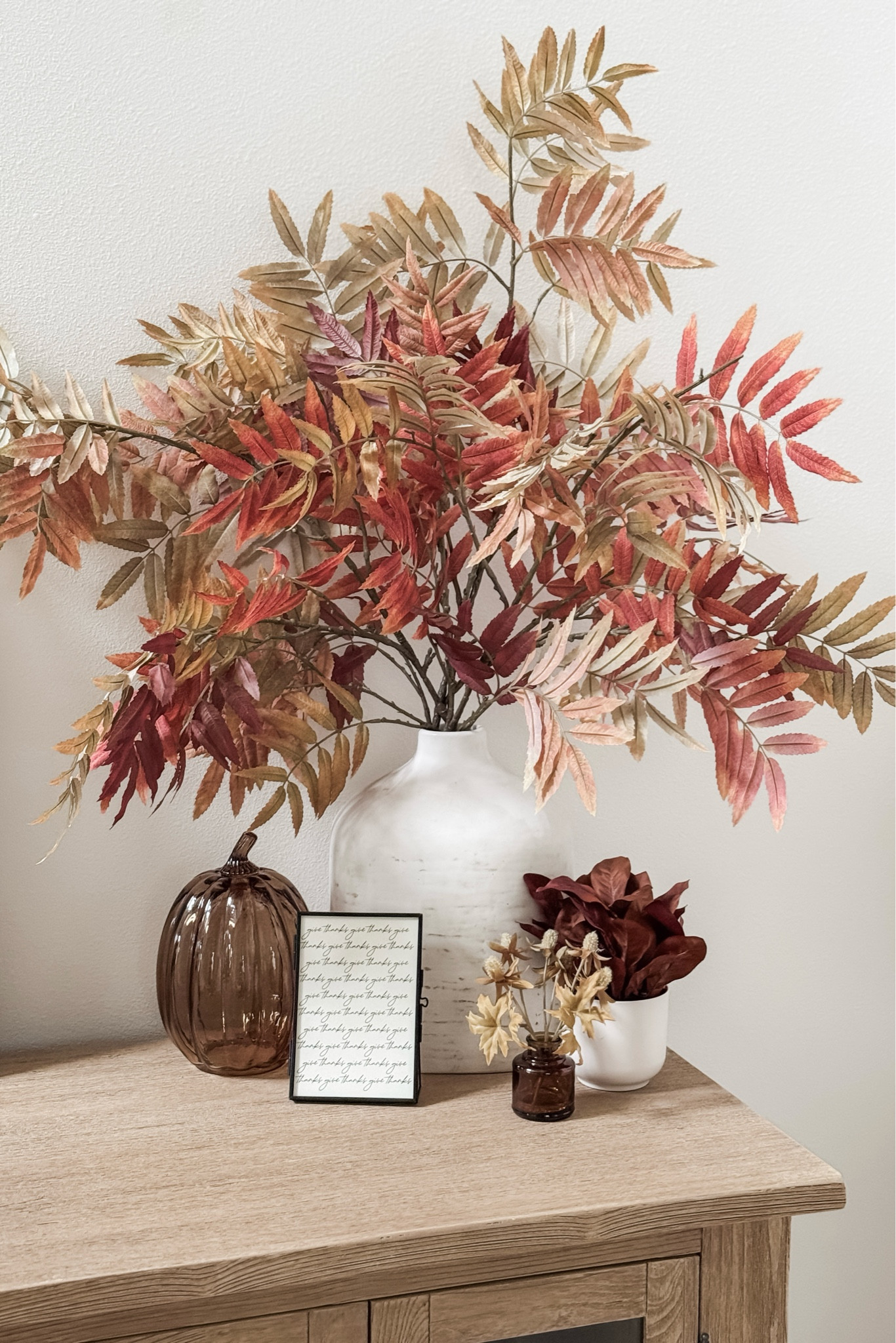 November means decorating for Thanksgiving! This vignette is at the other end of the buffet in our entryway. Because it's located in such a high traffic area of the house, I really enjoy decorating it every season. 

#LTKHoliday #LTKHome #LTKSeasonal