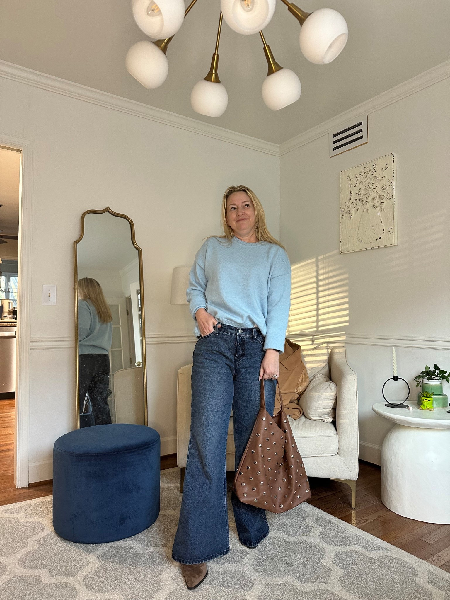 Light blue and chocolate brown combo I’m loving currently!
Suprise find at Walmart are these jeans. They fit so good and I honestly wasn’t going to try them on. Looking at the labels I was more wth would I buy these? Glad I tried them on.
Paired with old boots and this pretty studded purse from Amazon.
Sweater is from Vici and I have a code trilbysave35

#LTKmomlife #LTKPetite #LTKootd