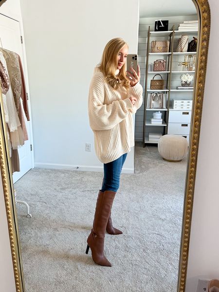 Oversized legging friendly sweater on sale. Wearing a small with skinny jeans (28) and knee high boots on major sale (they run big!). 

The sweater is very bump friendly and postpartum friendly! If you want a cozy thanksgiving outfit, you can pair it with leggings  

#LTKSeasonal