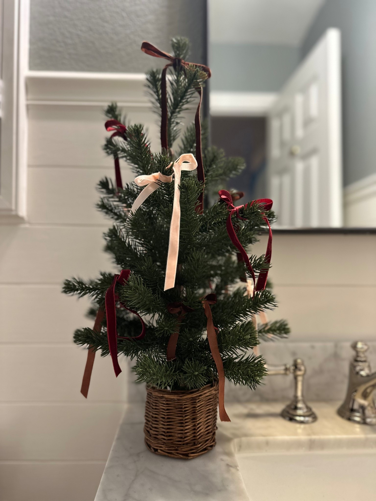 Simple Christmas tree with velvet ribbon bows instead of ornaments!

#LTKHoliday #LTKHome