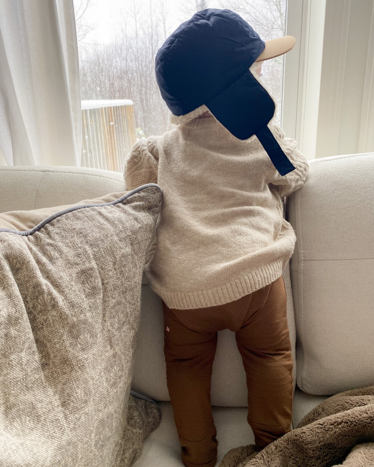 First snow of the season in our cute cable knit sweater! I love layering sweaters and sweatshirts over rompers for babies so they’re cozy and comfortable at the same time! Shepherds cute lined hat is waterproof for the snow and nice and warm! You can velcro ear flaps up or wear them down  

#LTKkids #LTKbaby #LTKfamily