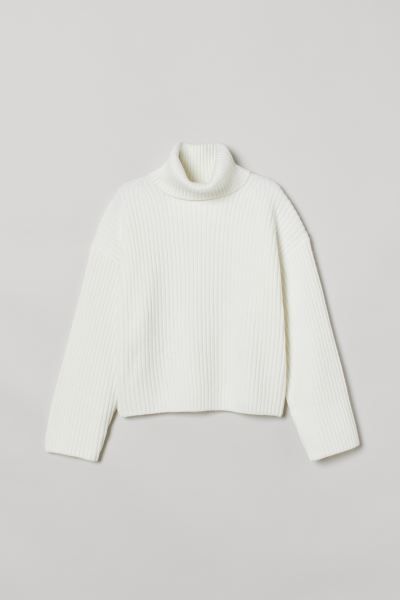 Boxy, turtleneck sweater in soft, rib-knit fabric with long, straight sleeves. Polyester content ... | H&M (US + CA)