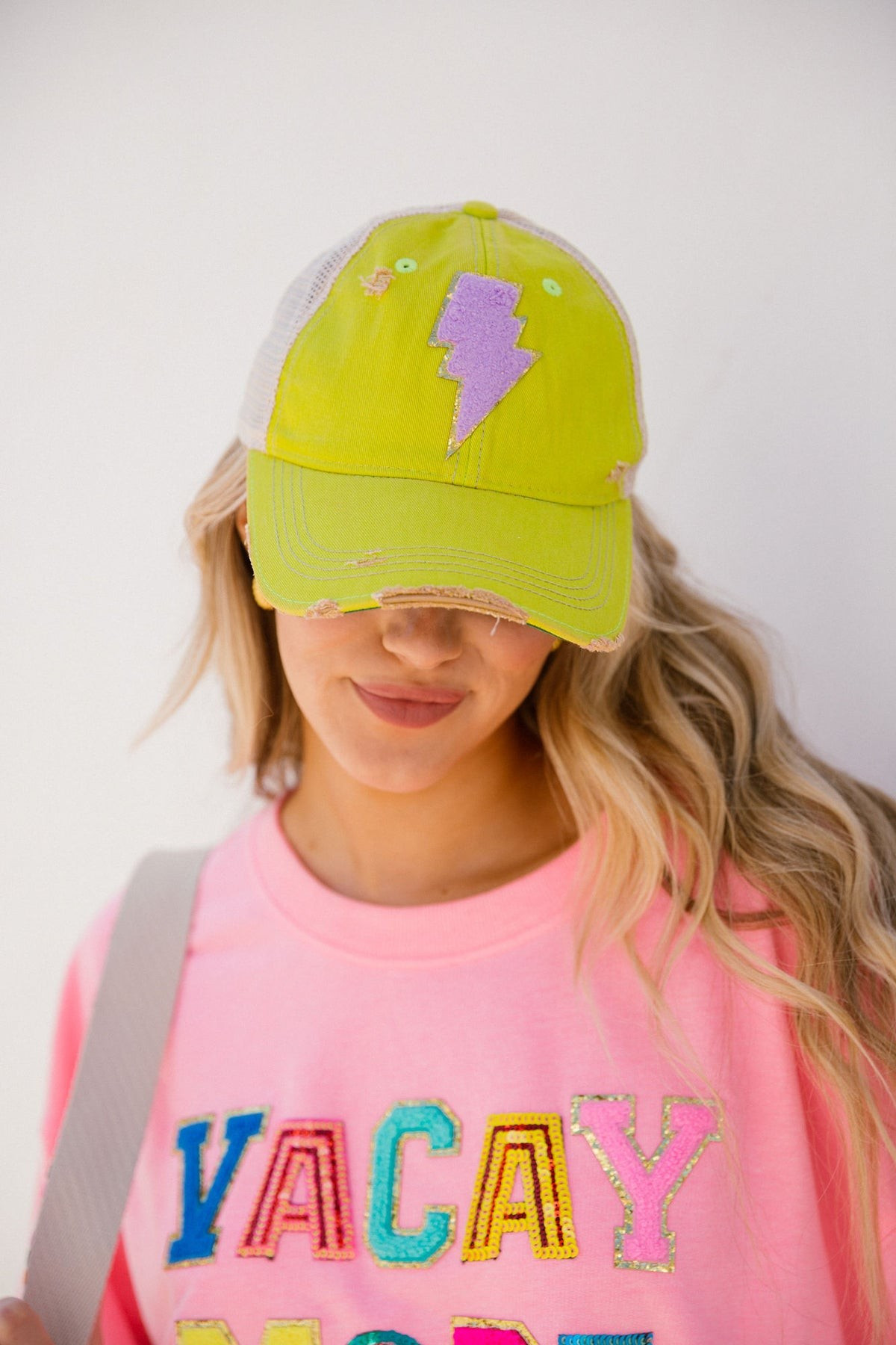 ELECTRIC PURPLE ON CHARTREUSE HAT | Judith March