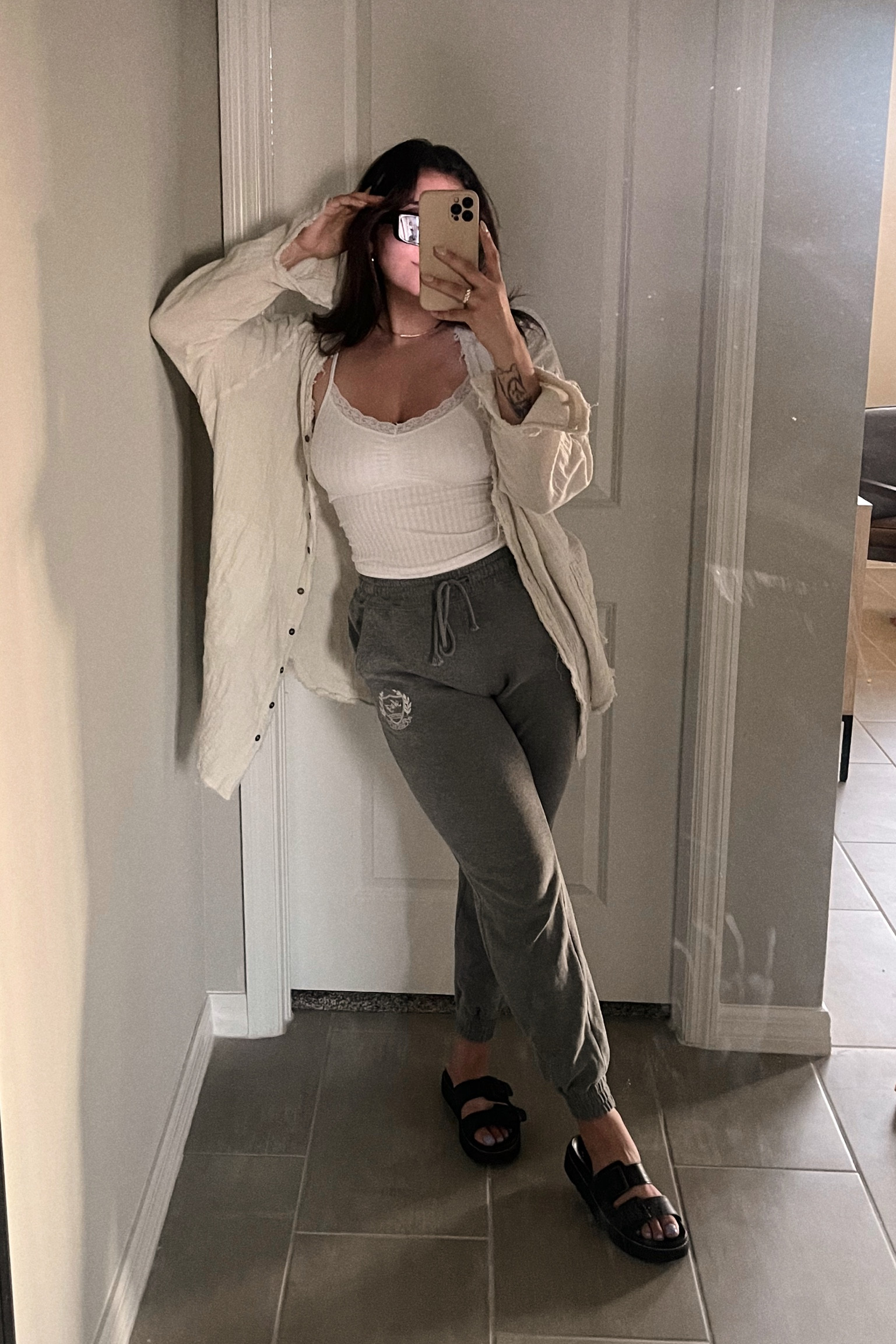 Little toddler hands on my mirror. Here’s a cute little lounge outfit as i run to the store. You guys love these Walmart sandals as much as i do!! And the look alike of this light gauze button down is onsale at Aerie! 

#LTKFind #LTKSeasonal #LTKunder100