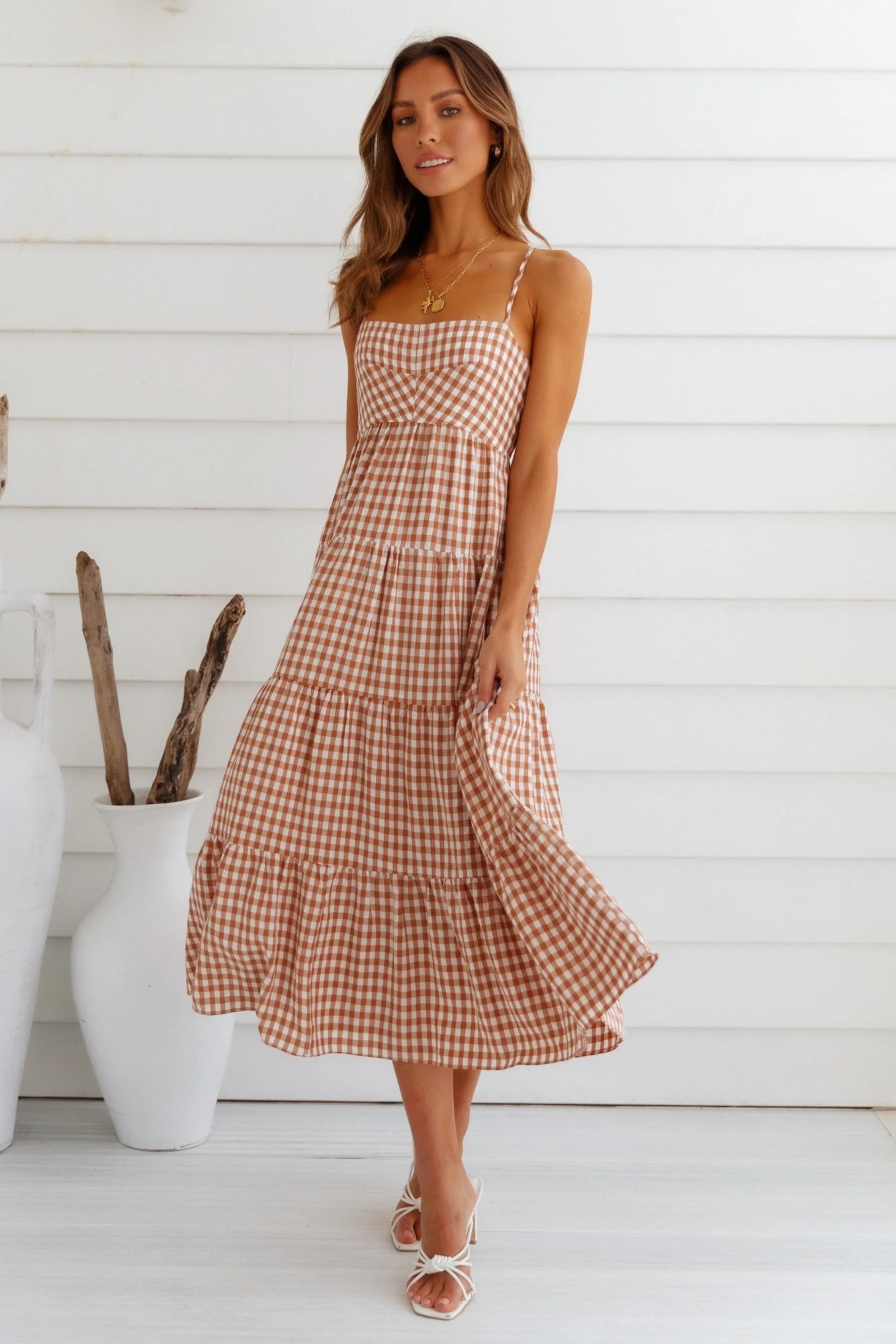 Burnt orange gingham dress from @hellomolly perfect for graduation, gamedays and everything in between!! Hook ‘Em!!🤘🧡 #texaslonghorns #texasgameday #burntorange #ut #gamedayfashion 
#longhornfinds #utlonghorns #utorange #texasfight #utaustin #longhorn #bevo #texasexes #burntorangedress #texasgraddress
