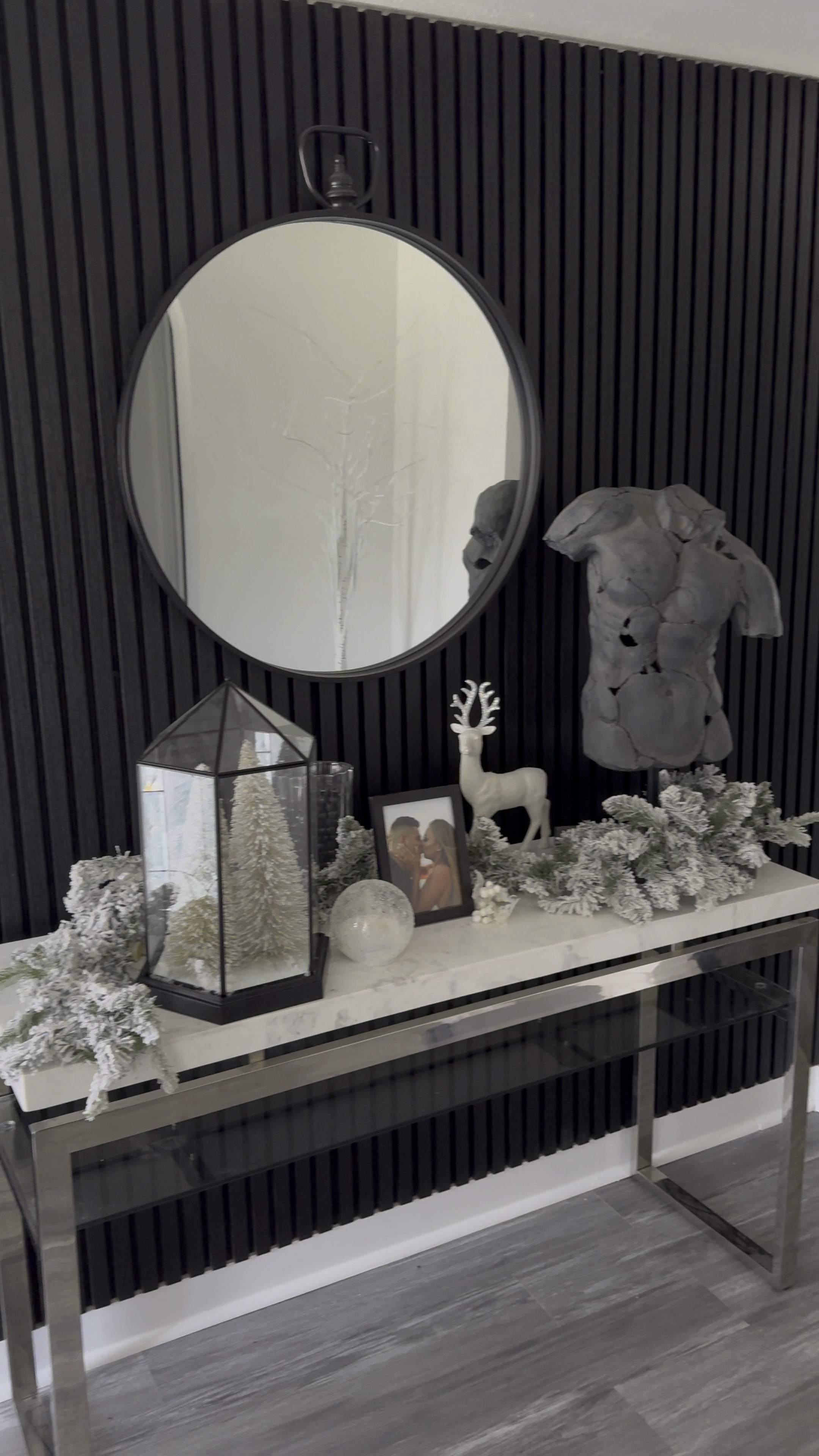 Beautiful black vinyl acoustic paneling for the wall. Helps add texture and modern twist to the whole room! Black bust statue for modern decor and nice rounded mirror to complete the full look for a beautiful entryway table set up! 

#LTKVideo #LTKhome #LTKSeasonal