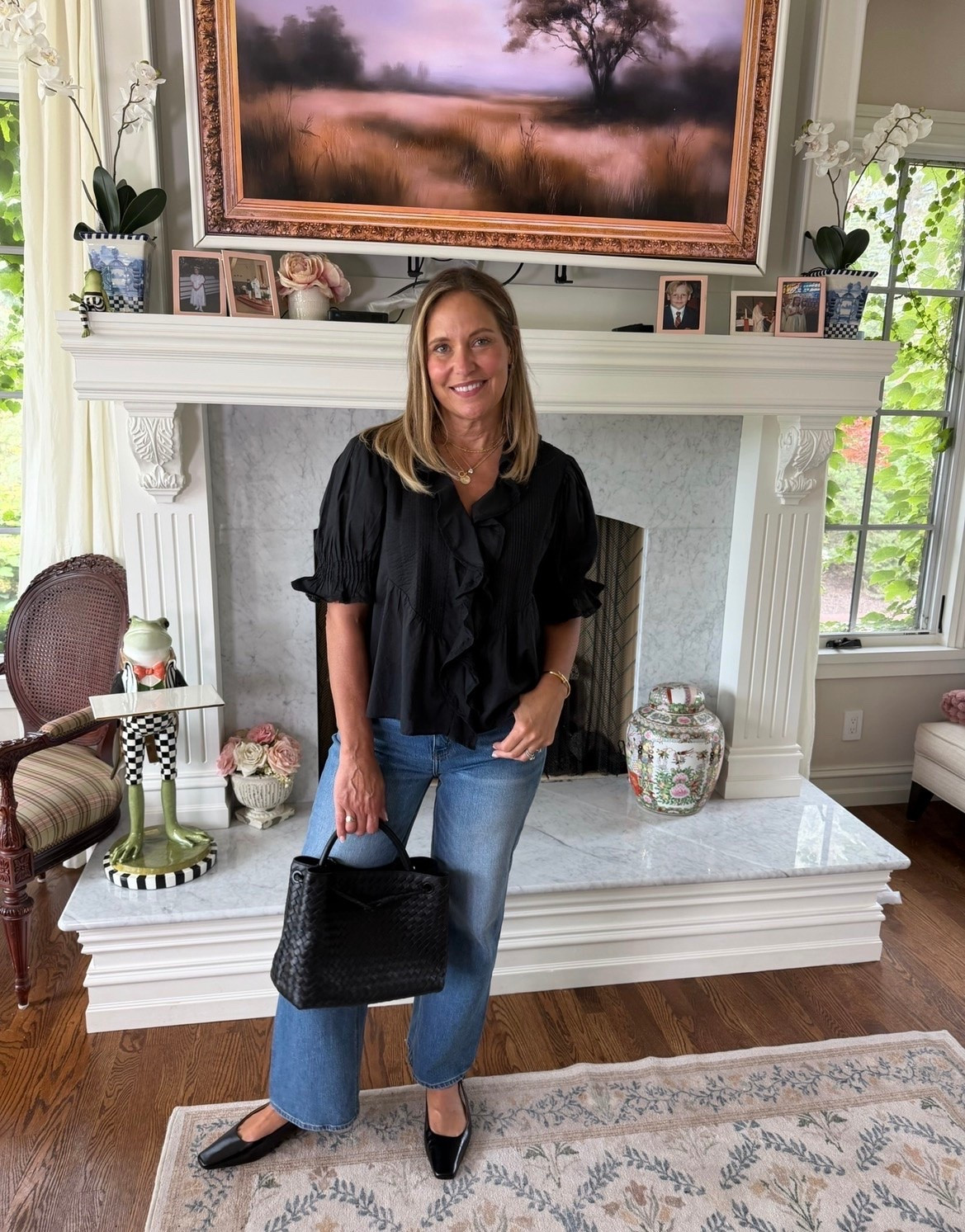 This top is such a flattering everyday shirt if you want something easy but still finished. It drapes beautifully, helps hide the meno-belly, and works so well with jeans for a simple over-50 outfit. Wearing a medium in the top and size 30 jeans.

#LTKMidsize #LTKOver40 #LTKootd