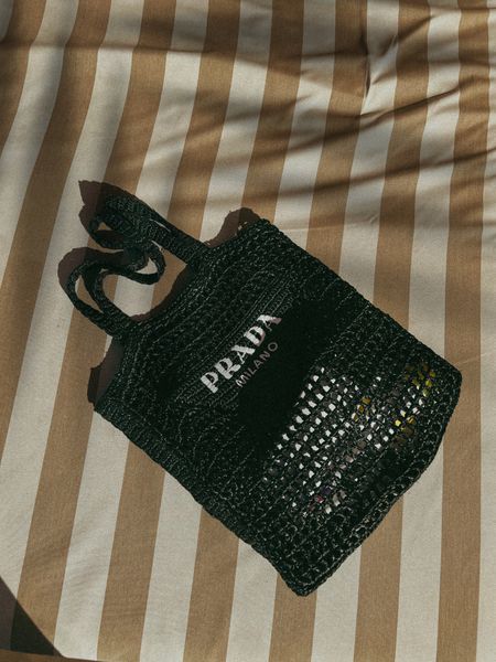 Raffia tote bag - linked dupes too - Prada vacation bag 

#LTKtravel #LTKstyletip #LTKitbag
