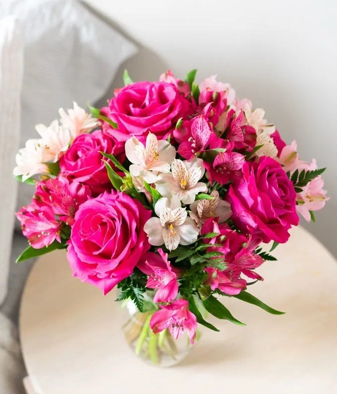 This gorgeous bouquet is composed of a rainbow of pink hues. Pink roses symbolize gratitude, grace, and joy with a beautiful feminine touch. These stunning roses are surrounded by a garden of long-lasting pink alstroemeria. A stunning bouquet of fresh flowers is the perfect way to show your appreciation, whether it's a special day or just because! ON SALE and under $60.

Includes:
• Pink Roses
• Pink Alstroemeria
• Glass Vase (Optional)
• Card Message

Keywords: Mother’s Day bouquet, gifts for her, Mother’s Day flowers, flowers for mom 

#LTKSaleAlert #LTKHome #LTKMothersDay