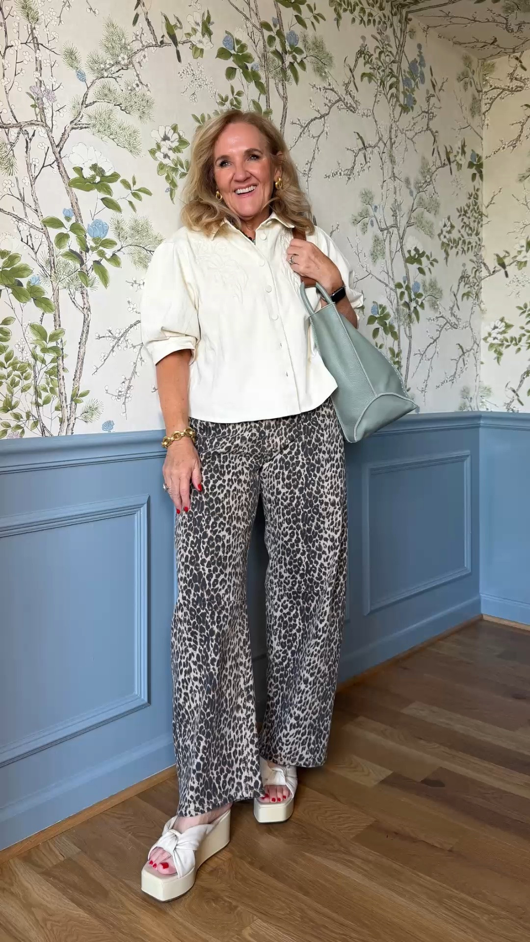 This crisp white blouse and leopard-print wide-leg pants make such a chic combination. The relaxed fit keeps the bold print comfortable while the soft green tote adds a fresh touch.

💡 LTK MADE EASY
❤️ Heart = Support my posts!
🔖 Save = Get sale & restock alerts
📋 Lists = Keep favorites organized
📲 Share = Send lists and products to a friend. Hello, Christmas List!
💬 Comment = Ask me anything about what I'm wearing.:-)

#LTKdayinmylife #LTKgrwm #LTKootd