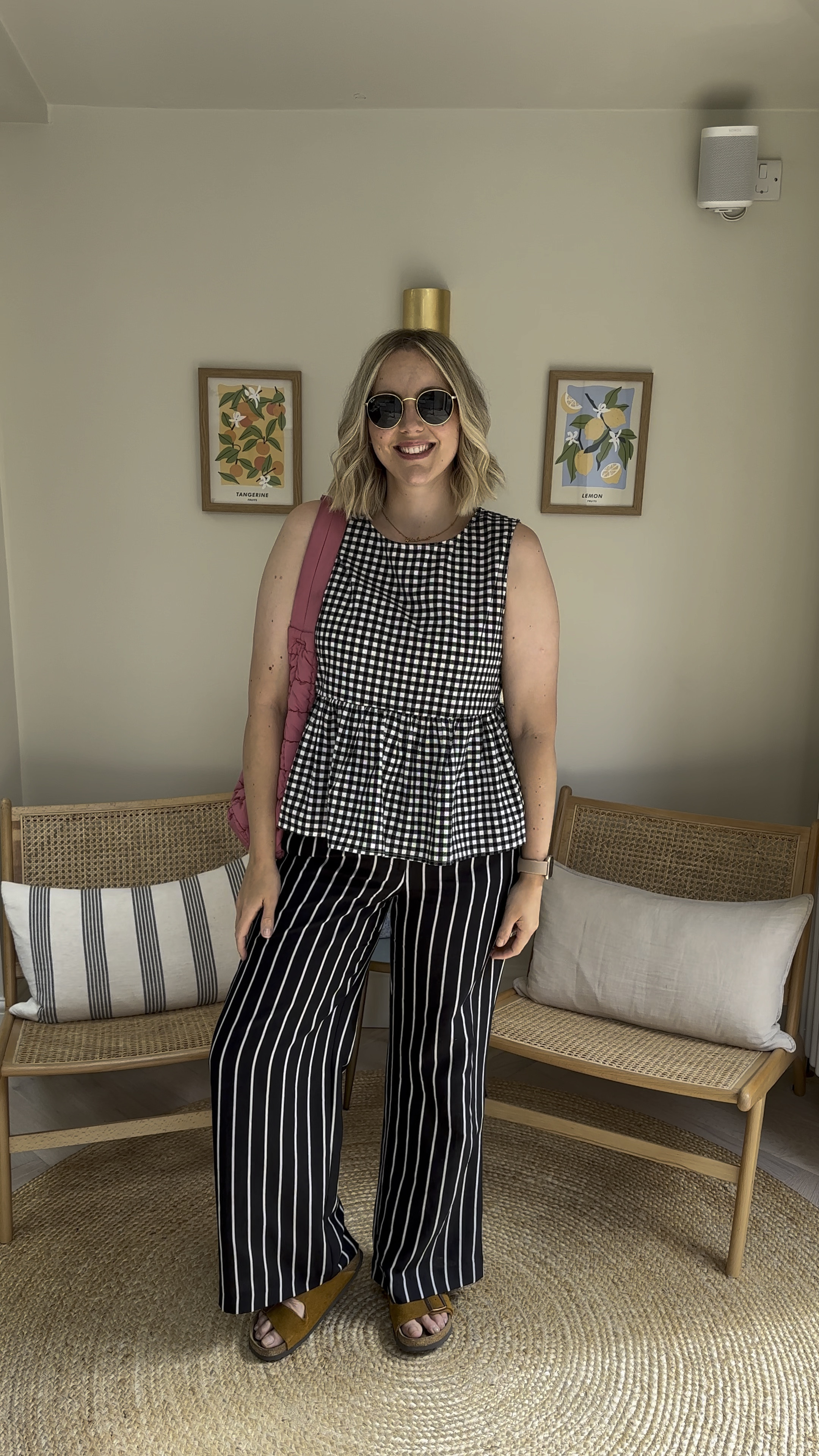 The perfect patterned work outfit does exist. 
Stripes and gingham are timeless and mixing the two of them can make an outfit more interesting. 
Birkenstock sandals, River Island Striped trousers via Vinted (Size 12), Gingham ASOS peplum top( Size M), M&S pink quilted bag and Rayban sunglasses  

#LTKuk #LTKworkwear #LTKsummer