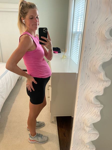 My go to walking outfit this pregnancy. This tank is $8 from target and I’ve been wearing them for years so cozy. Pair with high waisted align shorts with pockets

Maternity fitness style, bump style, pregnancy finds, pregnancy shorts , maternity shorts, maternity staples , workout shorts , hokas , sneakers , cute tennis shoes 