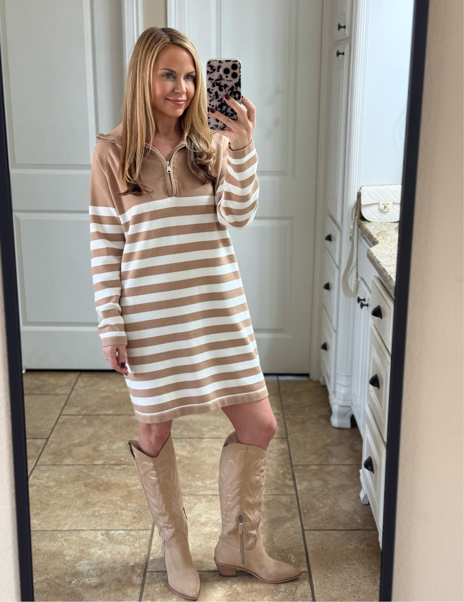 Striped sweater dress, wearing a small. Comes in several colors and under $40 

#LTKFindsUnder50 #LTKOver40 #LTKSaleAlert