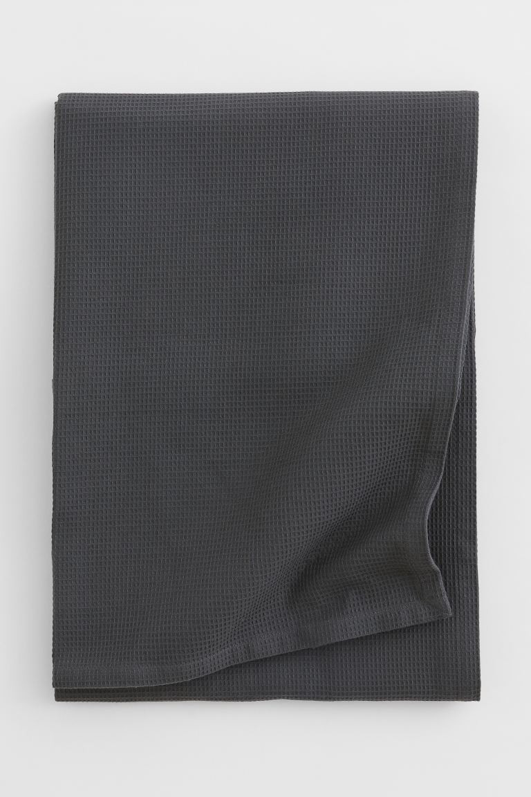 Conscious choice  Twin bedspread in woven, waffled cotton fabric made from a cotton blend.Weight1... | H&M (US + CA)