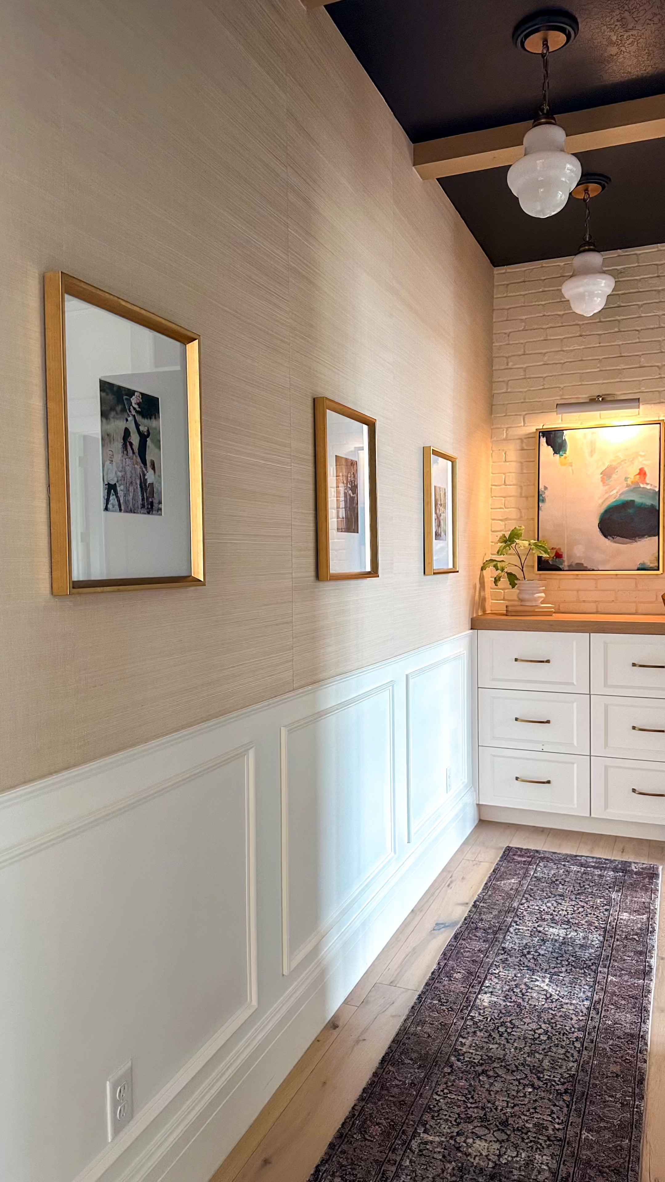 Make your hallways feel like more than just a pass through space.
Can light convertor kits, Grasscloth wallpaper, gold floating frames, art light, miter shears for wall moulding projects, runner rug, pendant lights

#LTKSaleAlert #LTKHome